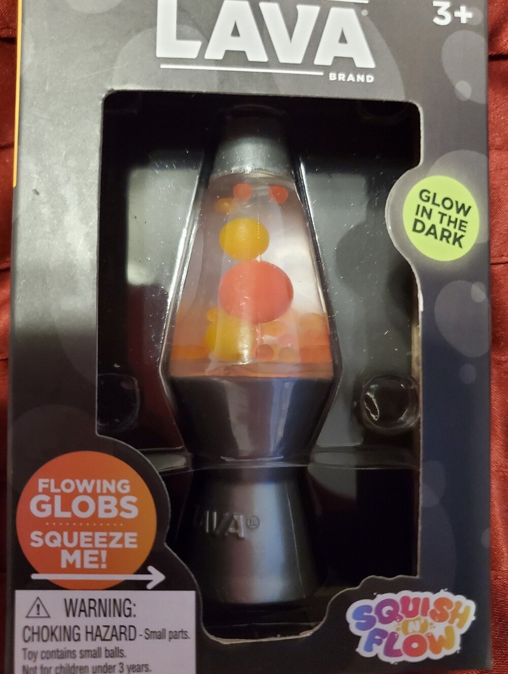 Schylling The Original LAVA Brand Squish N' Flow Squeeze Toy - Glow in the Dark